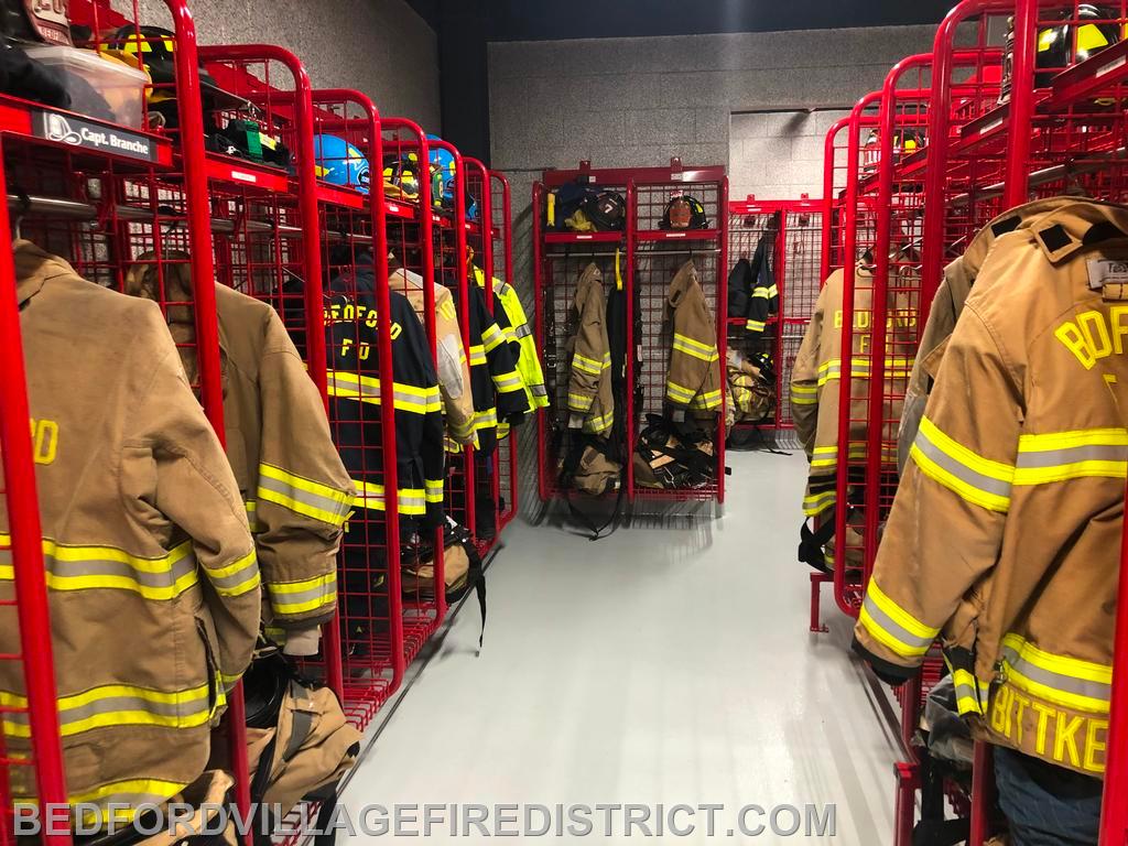 First Responders' gear is stored adjacent to but separate from the apparatus floor.